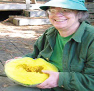 Carol Deppe with her Homestead Sweetmeat Squash